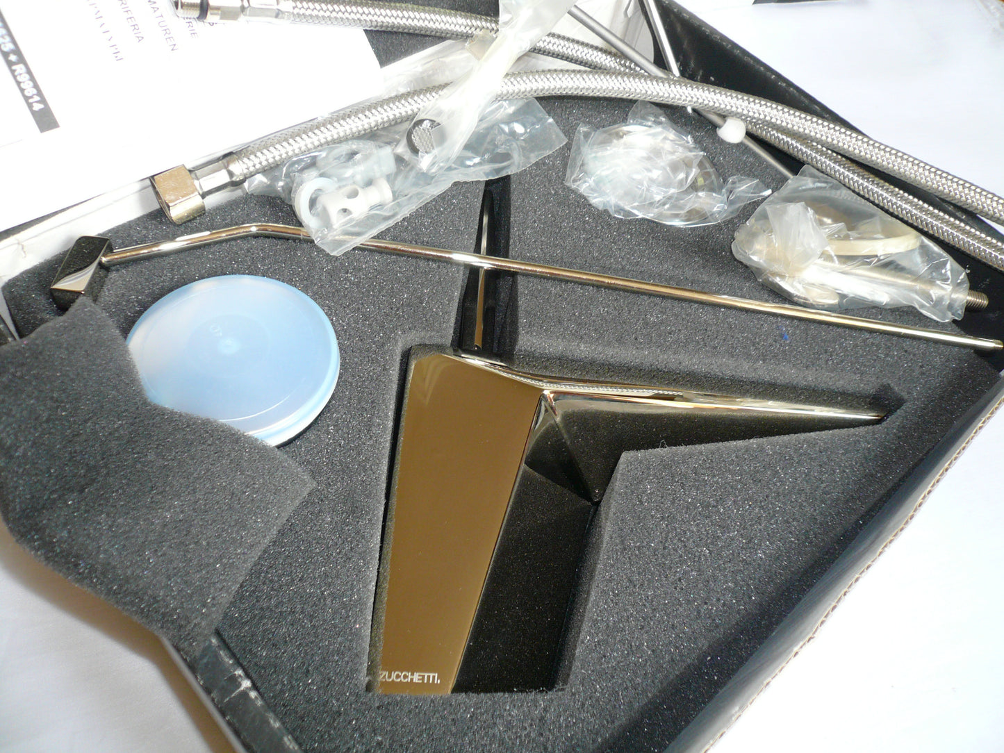 Zucchetti "Wosh" ZW1192.C5 single lever basin mixer with 1-1/4" pop-up waste set & flexible hoses. Solid brass constructed. in Platinum Finish.